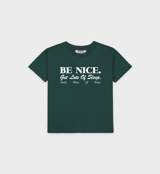 Green t-shirt with white text on a light gray background