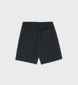 California Gym Short in Faded Black/Gold—crafted from 100% cotton with a drawstring waistband and single back pocket, shown on a white background.