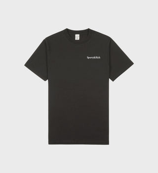 The Health is Wealth T-Shirt in faded black/white, made from USA-grown cotton, displays Sporty & Rich printed on the front.
