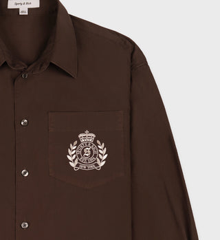 H&W Crest Oversized Shirt in Chocolate/Cream features an embroidered New York crest on the front pocket and is made in Portugal.
