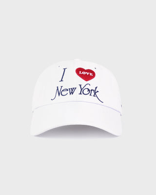 The I Love NY Hat - White is made from 100% cotton twill, features “I ♥️ LOVE New York” embroidered on the front, and has an adjustable closure for a comfortable fit.
