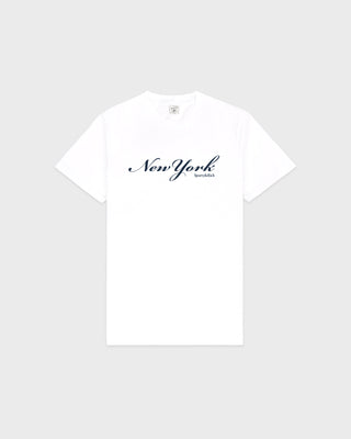The New York T-Shirt - White/Navy features New York in black script on the chest. Made in the USA from 100% cotton, it’s shrink-free for lasting comfort.
