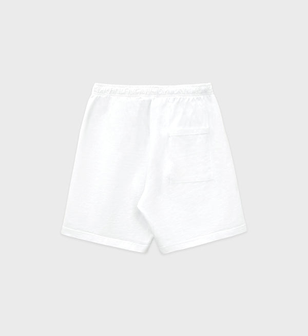 Back packshot view of white sweat shorts with an elastic waistband, side pockets, and a multi-colored 'New York Health & Wellness Club Sporty & Rich' text near the left hem.