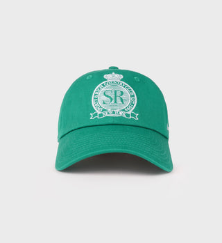 The Royal Club Hat in Spring Green/White is made from 100% cotton twill with a white embroidered crest and New York text on the front, plus an adjustable closure for comfort.