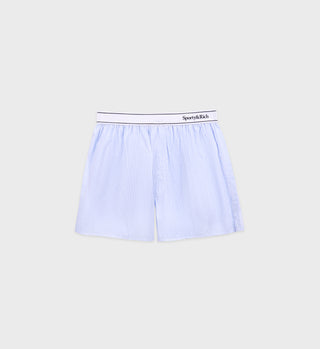 Serif Logo Boxer Shorts in white/light blue stripes, made of cotton with an elastic waistband. Made in Portugal and shown against a plain gray background.