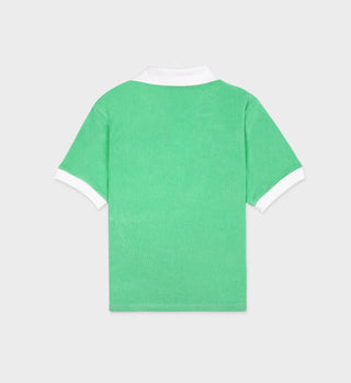 The Prince Sporty Terry Polo in Clean Mint/White features a green short-sleeve design with white collar and sleeve cuffs, made from 100% cotton and displayed from the back on a plain background.