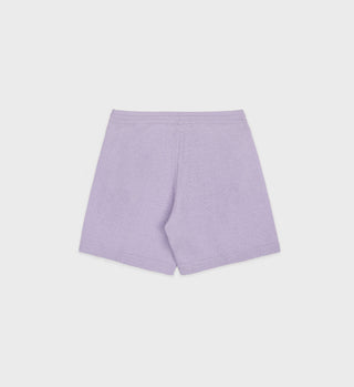 Back view of the Vendome Cashmere Short in soft lilac/white, featuring an elastic waistband, displayed on a plain white background.