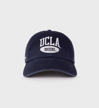 Navy baseball cap with white 'UCLA Bruins' embroidered text on the front, featuring a curved brim.