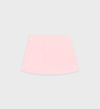 The Prince Sporty Court Skirt in baby pink and white features an elastic waistband and is shown flat, facing forward against a plain grey background.