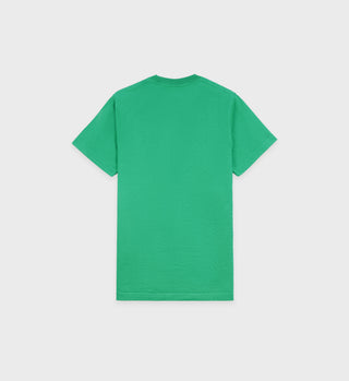 The Racquet Club T-Shirt - Grass is a plain green short-sleeve tee made from USA grown cotton, shown from the back against a white background.