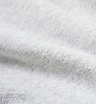 Close-up of the Studio Crewneck in Heather Gray, featuring soft-textured fabric with subtle folds—ideal for a timeless look.