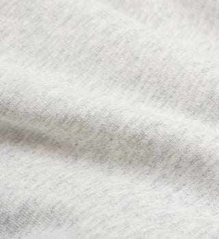 Close-up of the Vendome Sweatpant in Heather Gray/Navy, featuring soft textured fabric with gentle folds and a slightly fuzzy surface, crafted from USA-grown cotton and made in Los Angeles for exceptional quality.